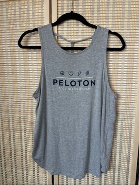 PELOTON Light Gray Logo Muscle Tank with open strappy back - Together We Go Far